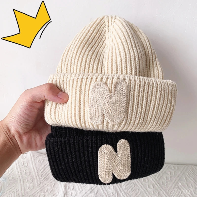 ins Children's hats Autumn/Winter N letter stick cloth knitted hats for boys and girls cute warm bun wool hat trend